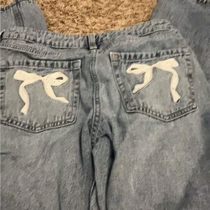 Hollister Blue and White Flare Jeans with Unique Graphic Design